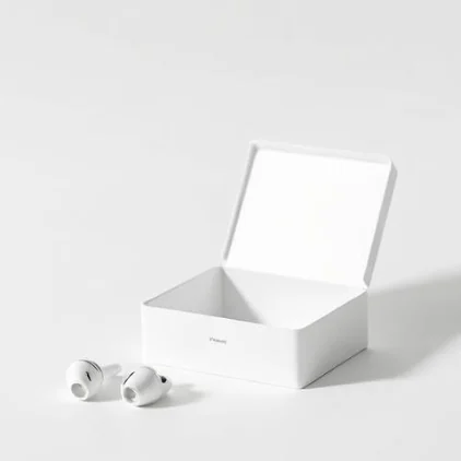 An open white gift box with the two earbuds placed in front of it — Packaging Shot style, generated by ListIQ Pro