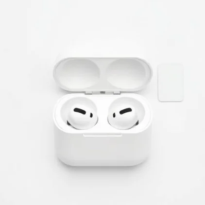 Open earbud case photographed from above beside a small card for scale — Size & Scale style, generated by ListIQ Pro